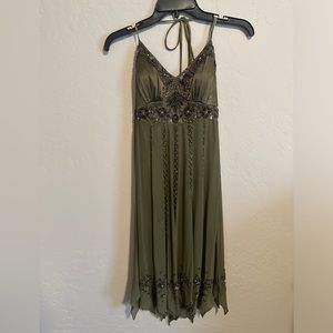 Beautiful beadwork silk cocktail dress. Like new. Size 2 adult.